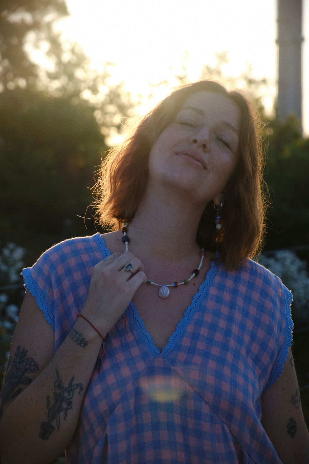 Amilita Haze Necklace worn at golden hour – multicolour beads and shell pendant, from the Sunset Haze collection
